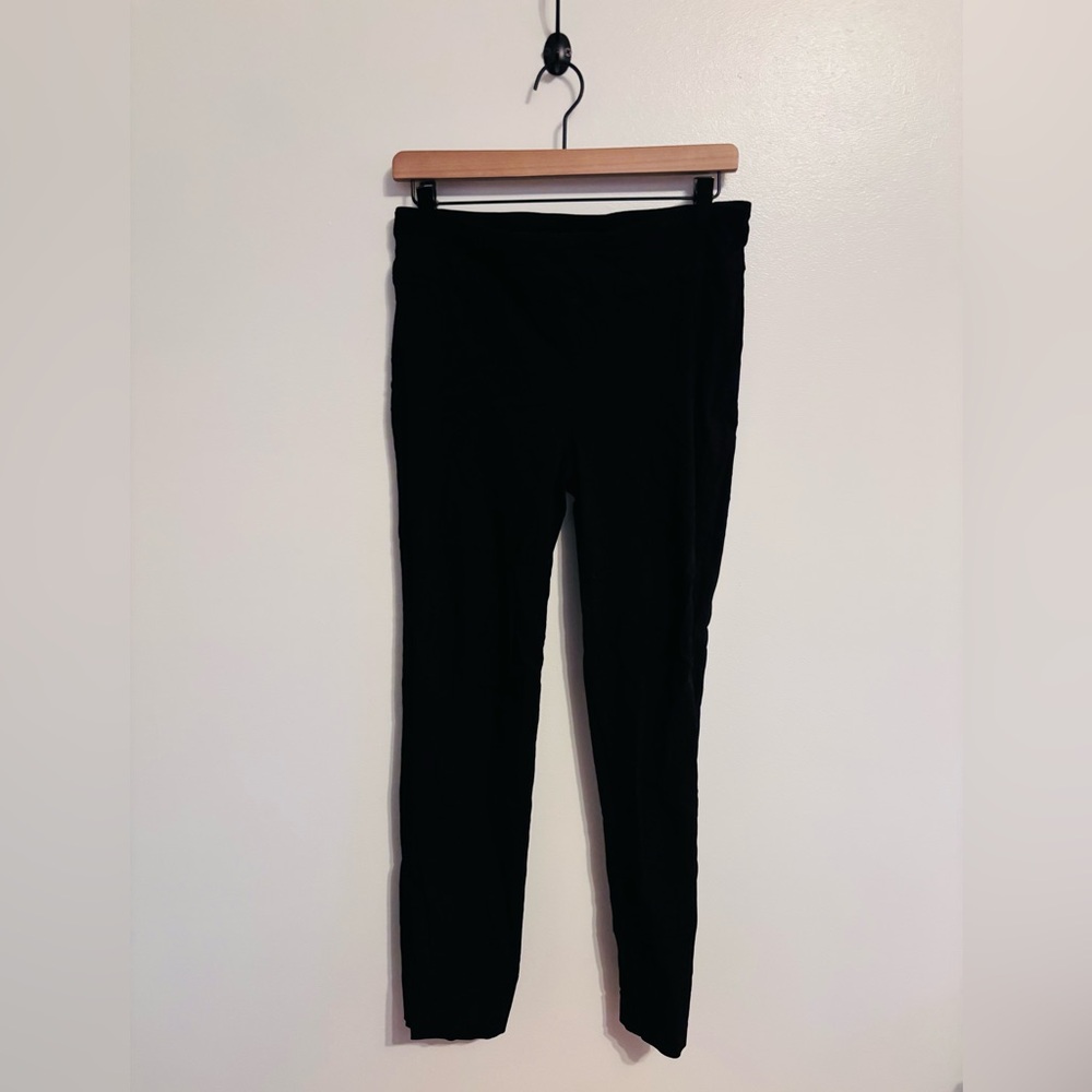 Hilary Radley black stretchy dress pants with some stretching wear at the seams